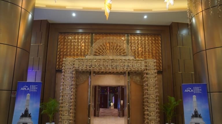 Decorated entrance arch at the APLA Regional Conference 2025